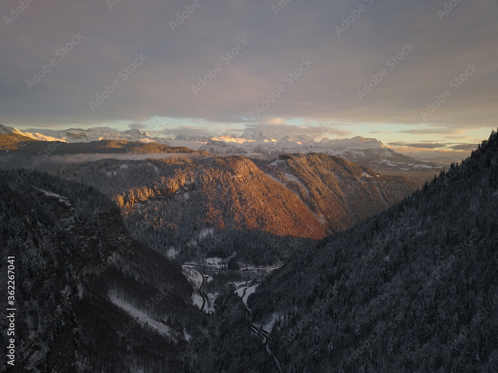 Aerial of sunset in Swiss mountais