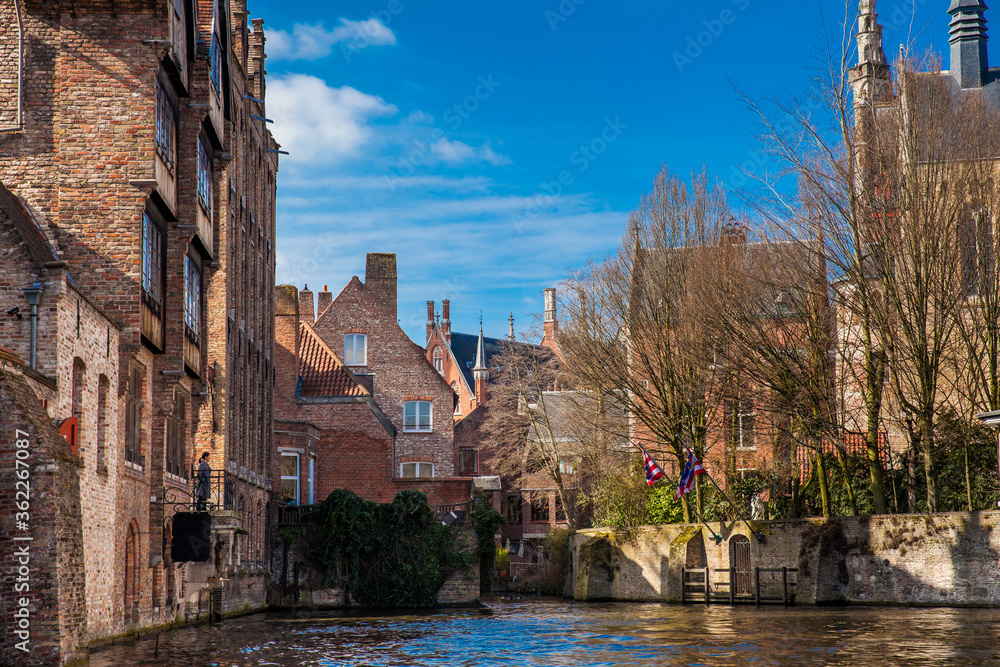 View of the city and the canals of the historical and beautiful Bruges town in Belgium