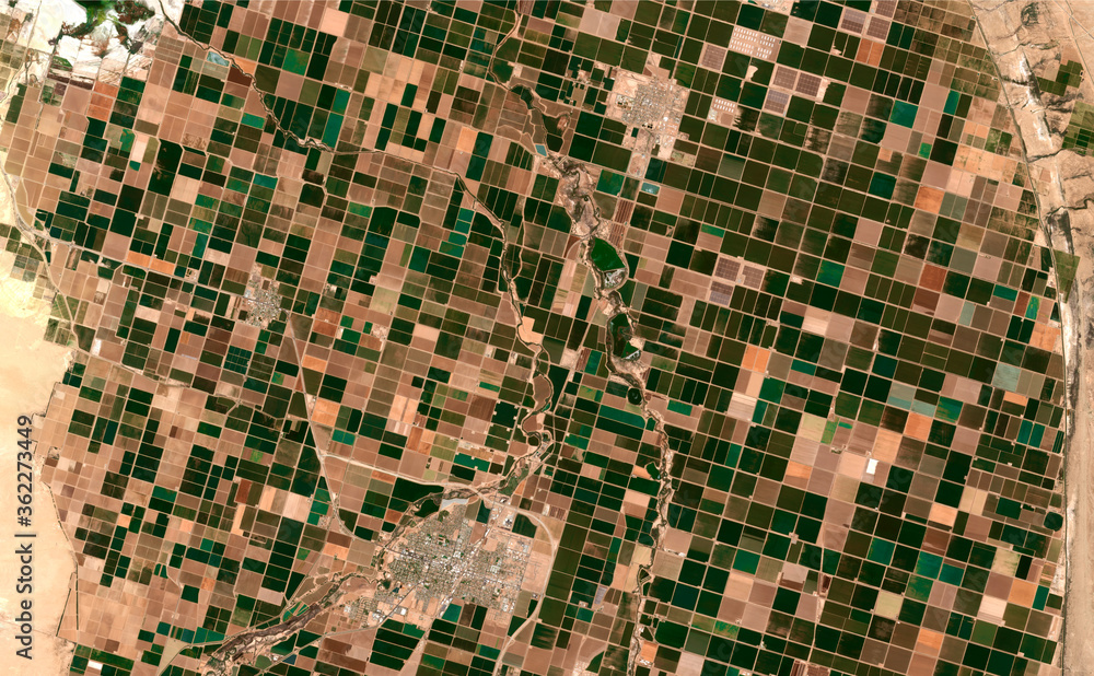 Image satellite of the presence crops and andcities. Sonora desert of Brawley, California, EUA. Observation of the surface of the earth from the sky. Generated and modified from satellite images.