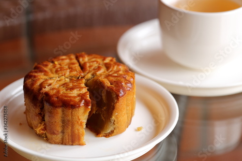 Moon Cake is Being Served and Complimented with Chinese Tea