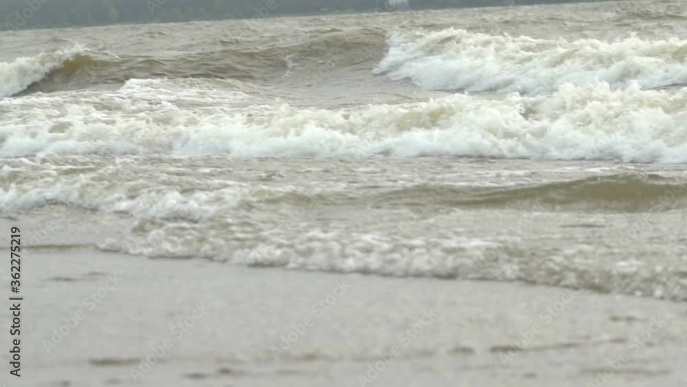 Slow motion waves with texture and wind spray, raw natural wonders Slow motion waves with texture and wind spray, raw natural wonders