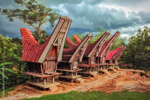 Tongkonan traditional rice barns in village. Tana Toraja, Sulawesi. Indonesia  photo