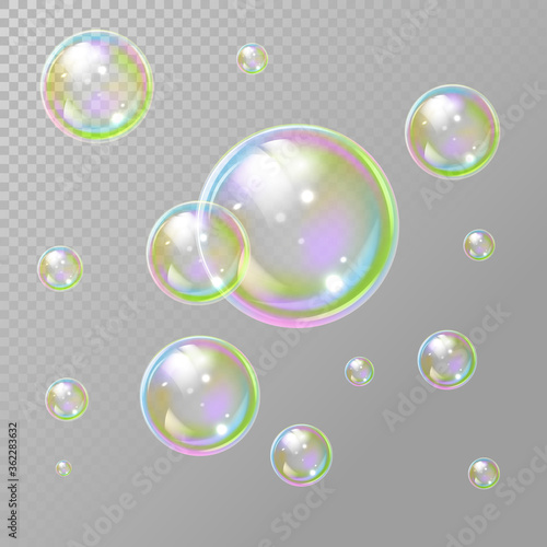 Transparent realistic set of soap bubbles. Soap bubbles in transparent background. Rainbow colorfull reflection soap bubbles. Isolated vector illustration. EPS 10