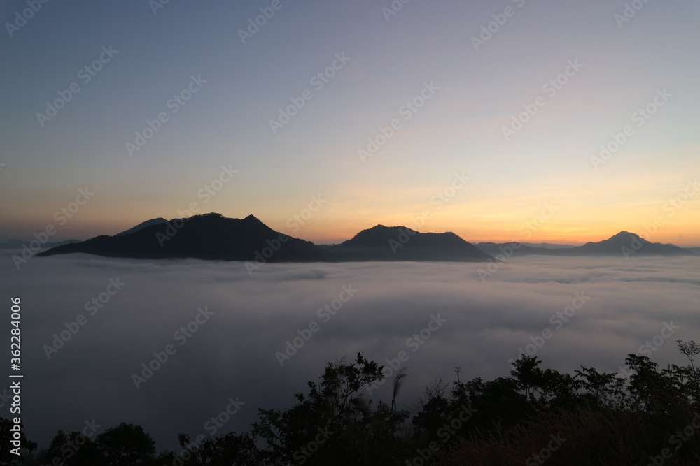 Beautiful landscape in the mountains at sunrise, Traveling concept background.Chiang Khan Loei, Thailand.