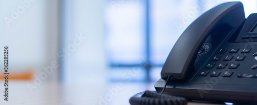 close up telephone landline at office background fo telecommunication technology and business concept 