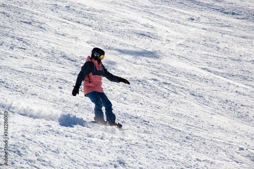 young woman skiing in snow