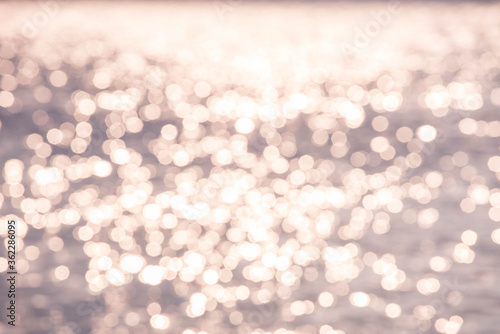 rose gold lights bokeh reflect on the sea