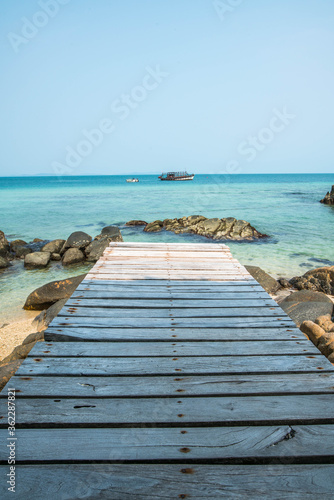 A wooden bridge protruding into the sea