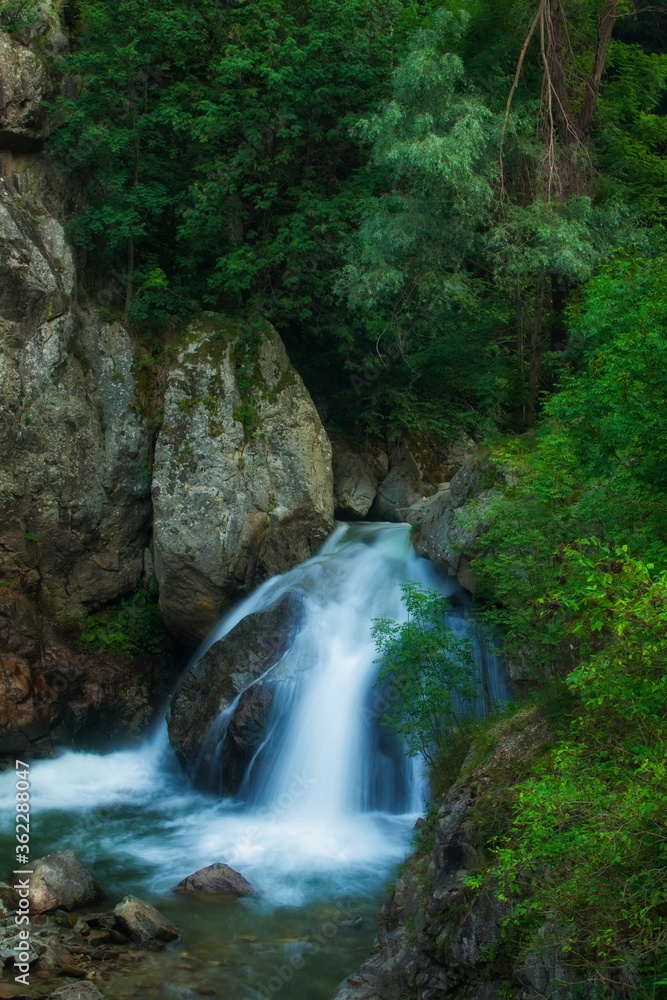 waterfall in the mountains waterfall in the mountains