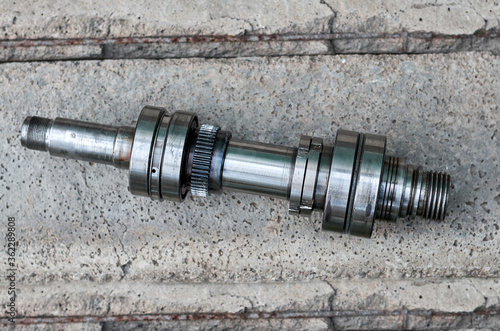 shaft gear bearing on concrete background