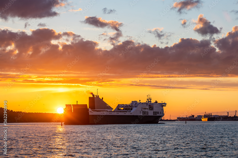 Ferry vessel at sunset in Klaipeda harbour in Lithuania