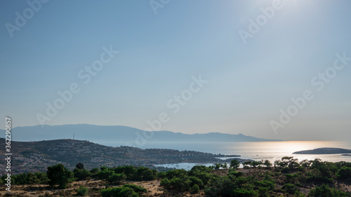 top view of bright sea with blue sky on sunny summer day,unfocused