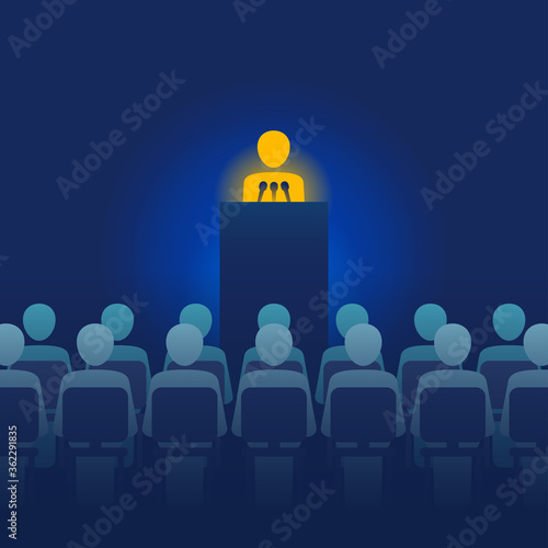 Speaker perfomance - orator staying on tribune (podium) with mocrophones and group of people sitting on chairs