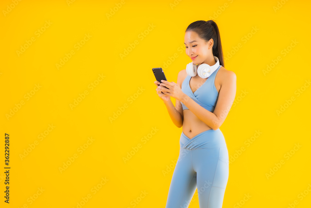 Portrait beautiful young asian woman wear sport wear with smart phone Portrait beautiful young asian woman wear sport wear with smart phone