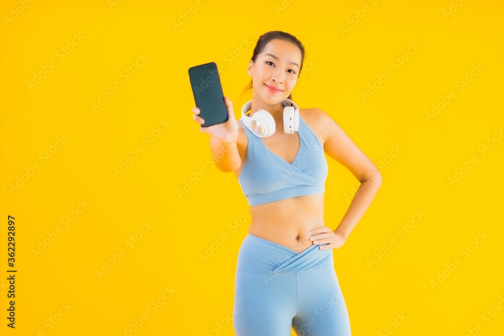 Portrait beautiful young asian woman wear sport wear with smart phone Portrait beautiful young asian woman wear sport wear with smart phone