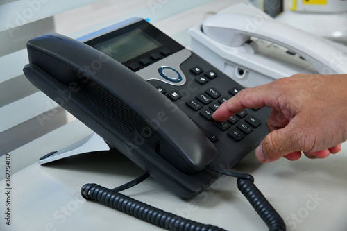 Detail of using a telephone keypad. Shallow dof