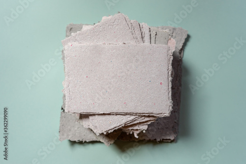 A stack of handmade paper. Waste paper recycling.