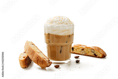 Billede på lærred Iced coffee latte with whipped cream and biscotti cookies in glass