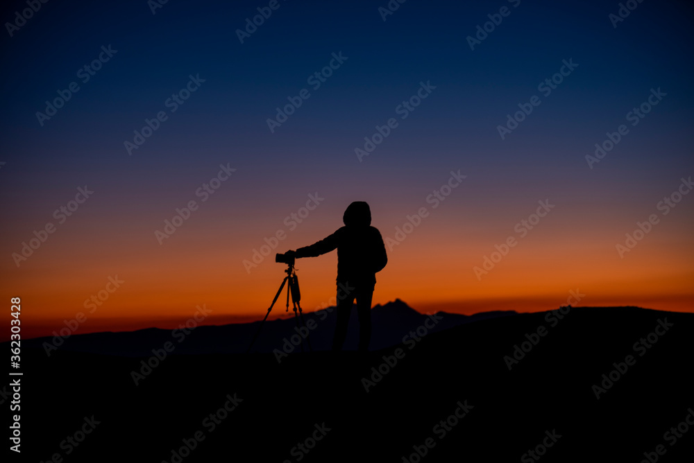 portrait of a photographer at the sunset portrait of a photographer at the sunset