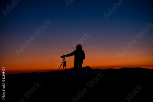 portrait of a photographer at the sunset