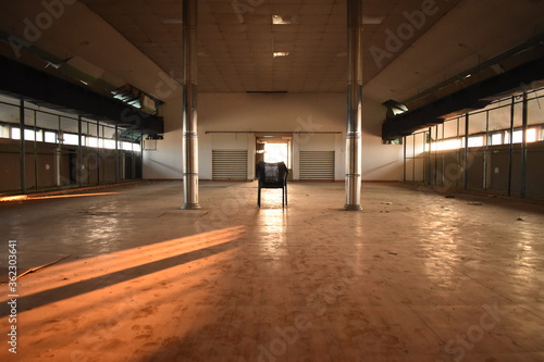 An empty hall during sunrise