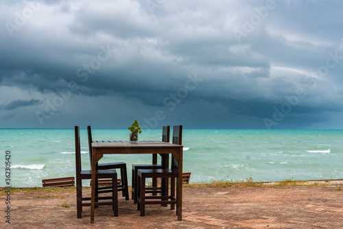 cafe by the sea during a storm on Koh Samui in Thailand  a restaurant without visitors  an empty restaurant on the beach