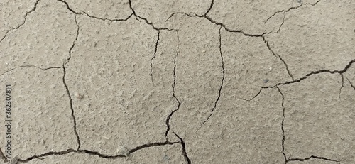 texture of old cracked wall, earth , road.