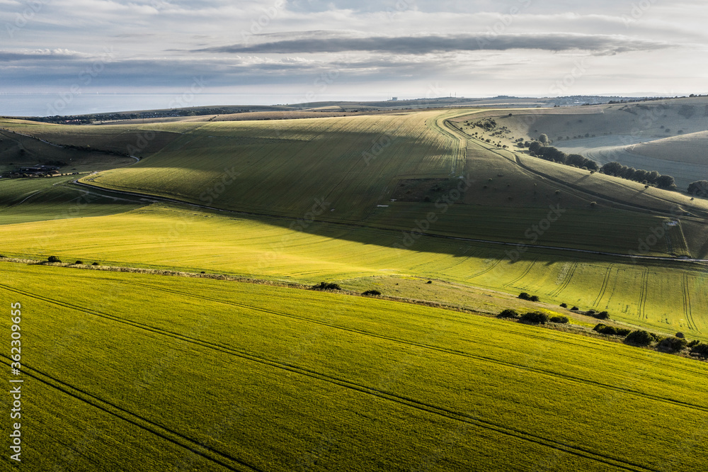 Stunning drone landscape image of English countryside during late afternoon sunset Summer light