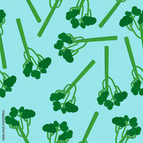 Seamless green broccolini pattern on a blue background. Pattern with a new type of broccoli