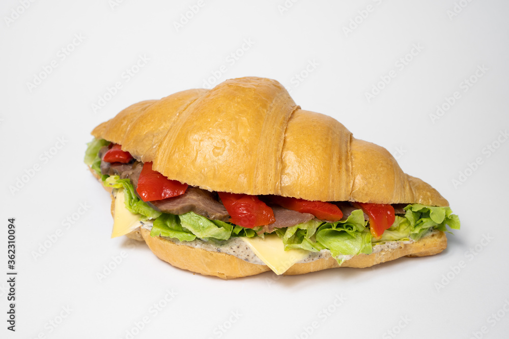 close up photo of a croissant with stuffing on a white background close up photo of a croissant with stuffing on a white background