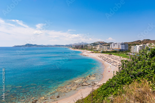 View of bay with sandy beach in Faliraki. Rhodes island, Dodecanese, Greece. © vivoo