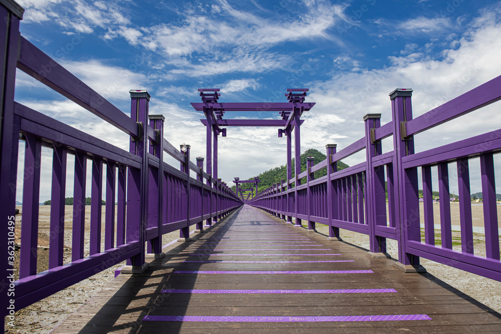 The beautiful purple color wooden bridge background  blue sky
