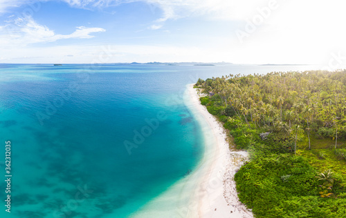 Aerial: exotic tropical island white sand beach away from it all, coral reef caribbean sea turquoise water. Indonesia Sumatra Banyak islands © fabio lamanna