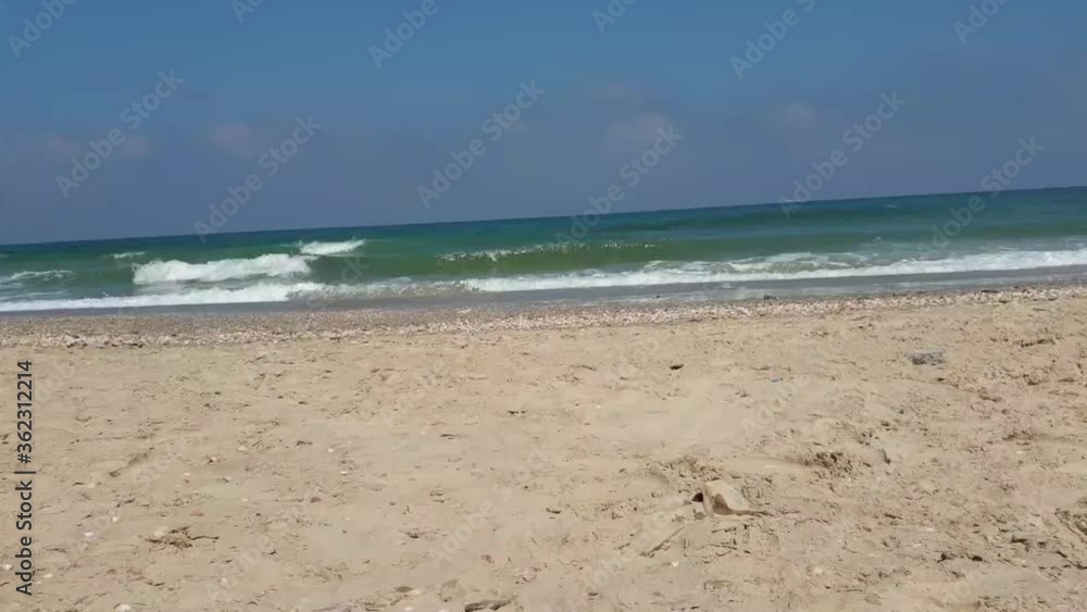 Sandy beach, Blue sky and sea waves background Sandy beach, Blue sky and sea waves background