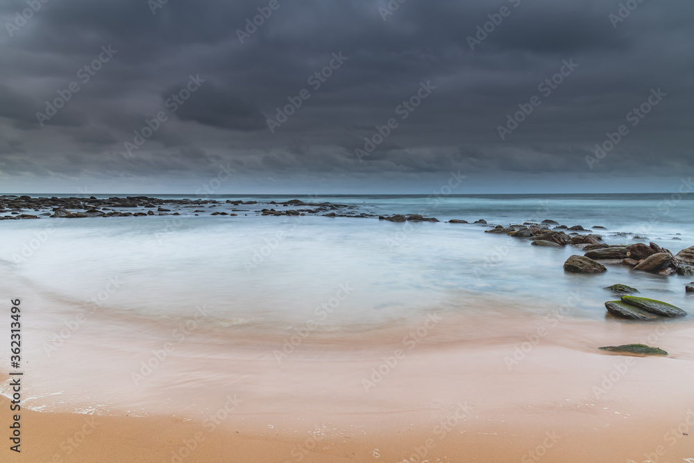 Rain Clouds at Copacabana - Overcast Sunrise Seascape