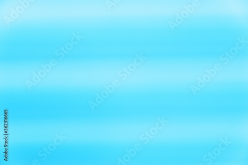 blur image of blue louver is background.