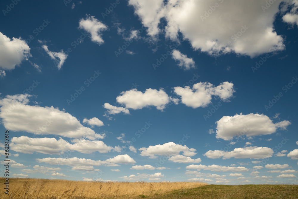 beautiful photo of blue sky with clouds and field in Ukraine beautiful photo of blue sky with clouds and field in Ukraine