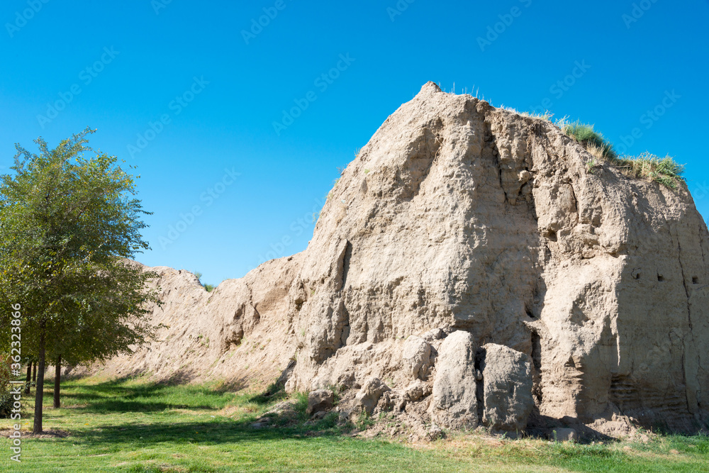 Fototapeta premium Ruins of City wall in Shakhrisabz, Uzbekistan. It is part of the Historic Centre of Shakhrisyabz World Heritage Site.