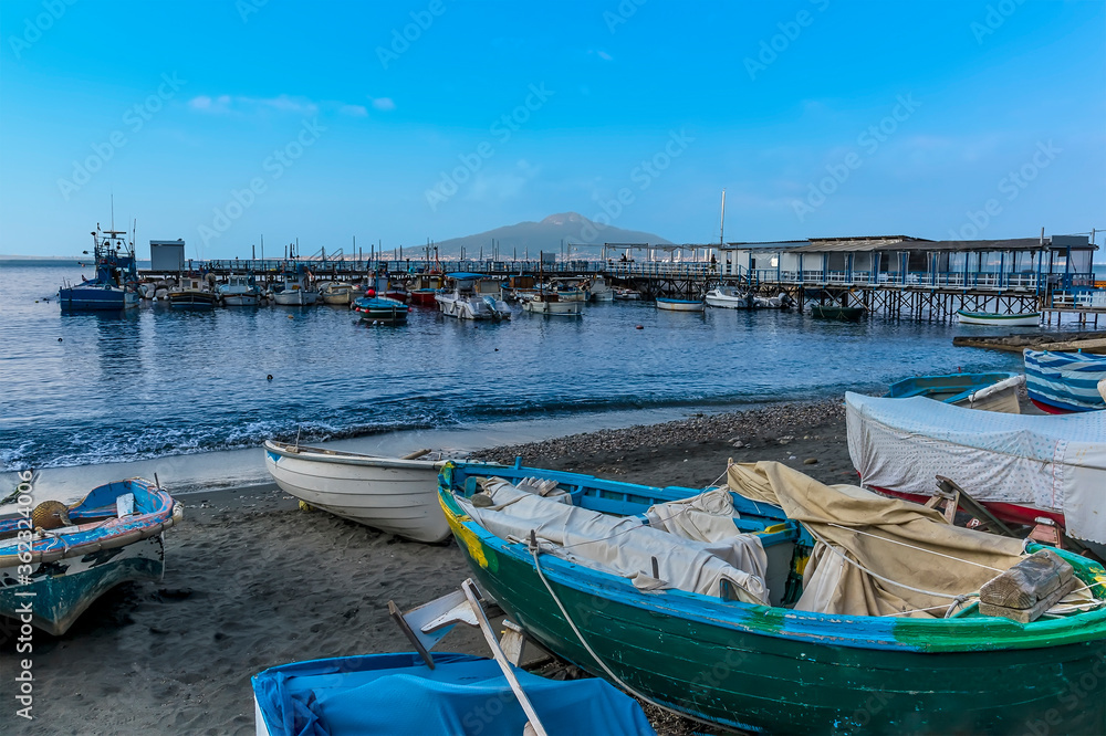 A view from the beach in Marina Grande, Sorrento, Italy towards the Bay of Naples and Mount Vesuvius