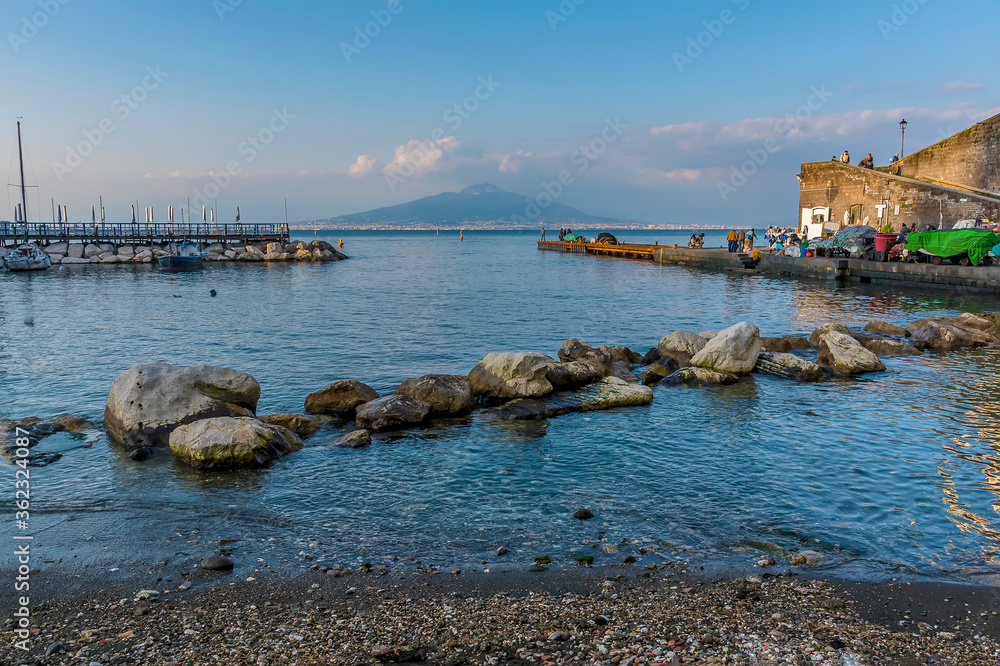 Looking out from the beach in Marina Grande, Sorrento, Italy towards the Bay of Naples and Mount Vesuvius