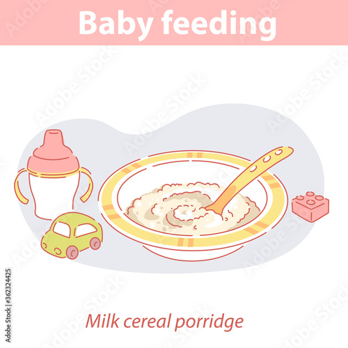 Baby feeding. Milk cereal porridge for baby.