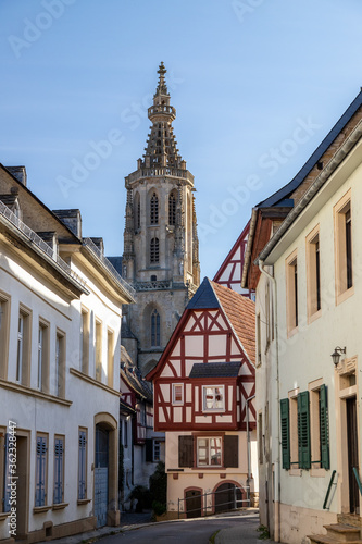 Cobbled road with historic houses and Schlosskirche in Meisenheim