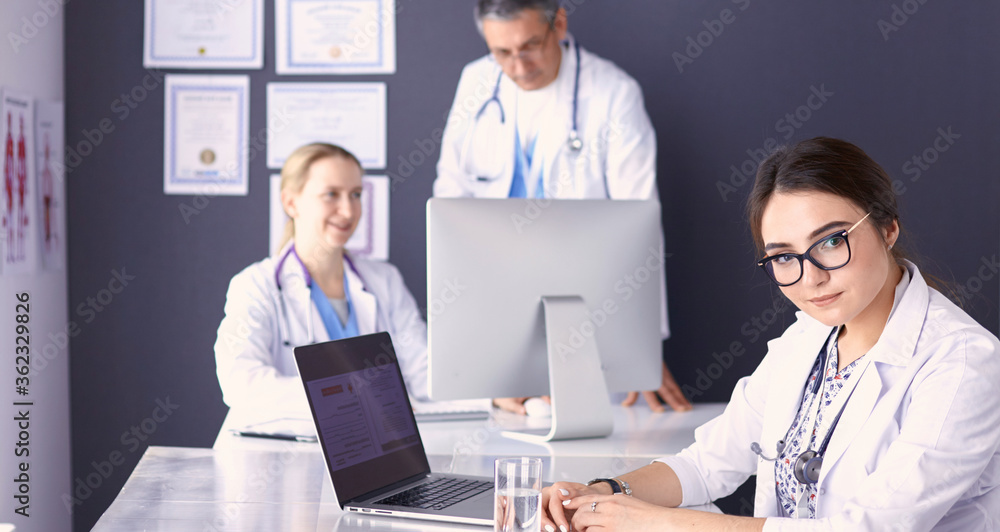Doctors having a medical discussion in a meeting room Doctors having a medical discussion in a meeting room
