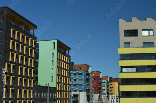 Colorful residential apartment buildings in the modern city district called Jätkäsaari in Helsinki, Finland.