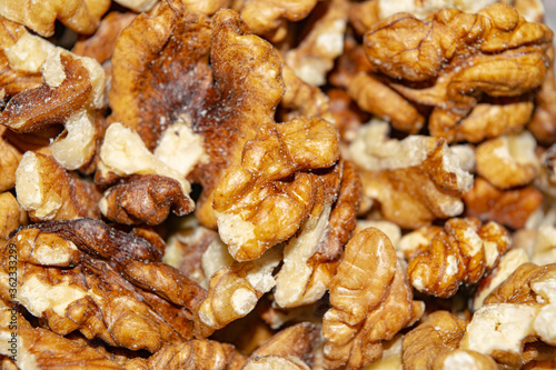 Peeled walnuts close-up. Surface texture. Healthy diet.