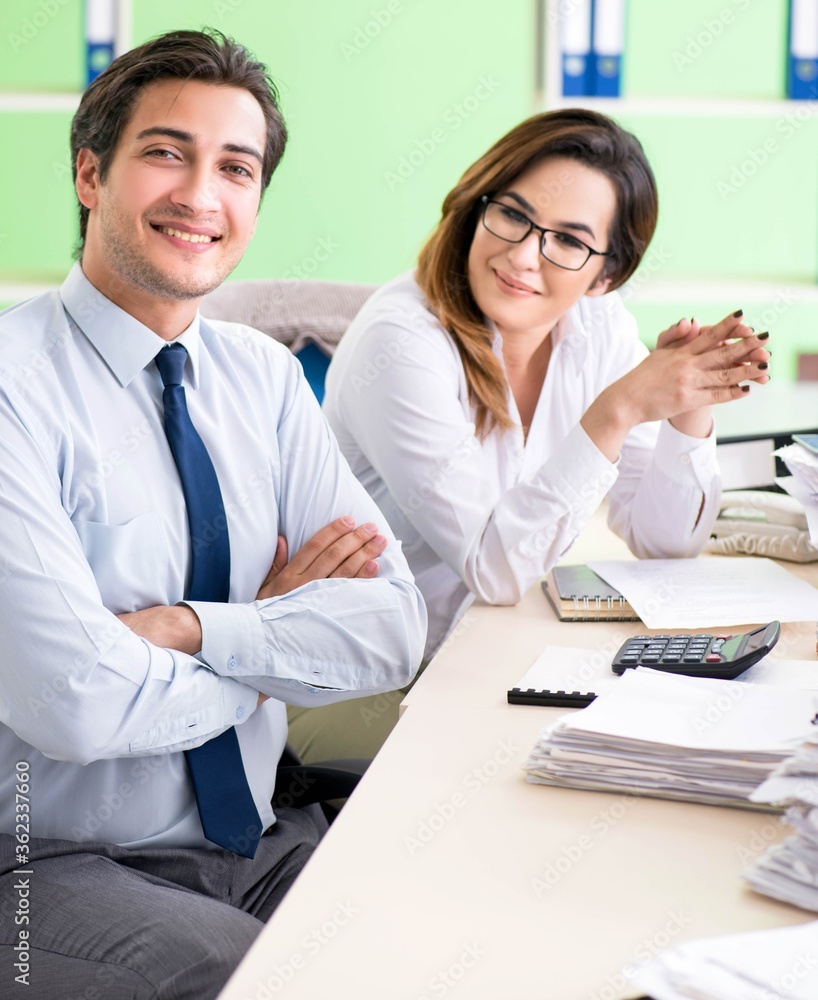Fototapeta premium Two colleagues working in the office