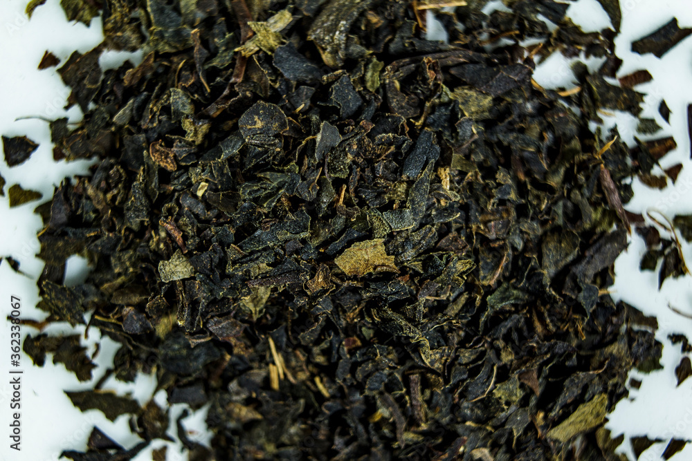 pile of powdered tea leaves / close macro shot pile of powdered tea leaves / close macro shot