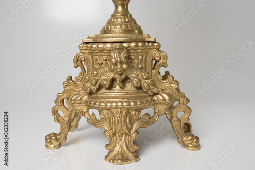 the lower part of the chandelier on a white background, the lower part of ancient candlestick studio photo, the lower part of antique candlestick isolated, the lower part of brass chandelier
