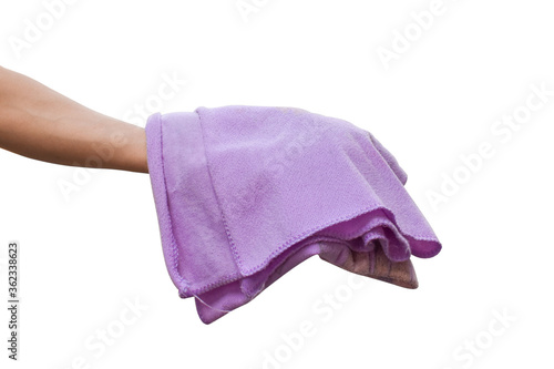 Purple cloth in hand isolated on white background with clipping path.
