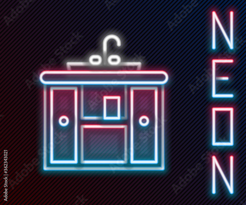 Glowing neon line Washbasin cabinet with water tap icon isolated on black background. Colorful outline concept. Vector Illustration.